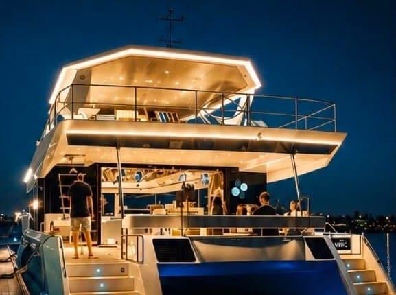 A catamaran lit up at night in Anping, Tainan