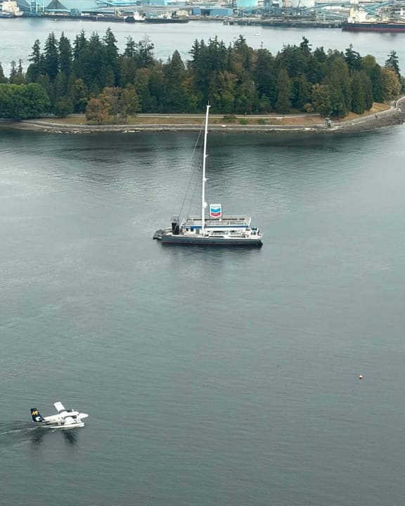 S/V Path fuelling up off Stanley Park — Harbour Air conveniently "in for scale"