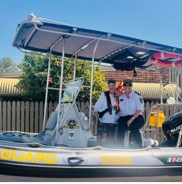 Volunteer Coast Guard: safety boat for the Caloundra ocean swimmers, then Emergency Services Day with the kids